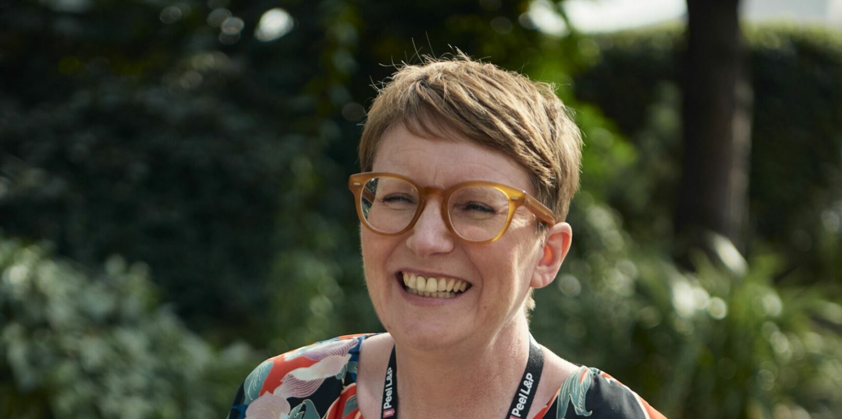 Jo Holden, smiling