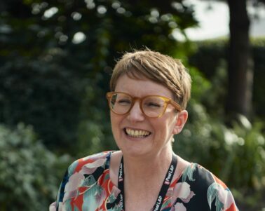 Jo Holden, smiling