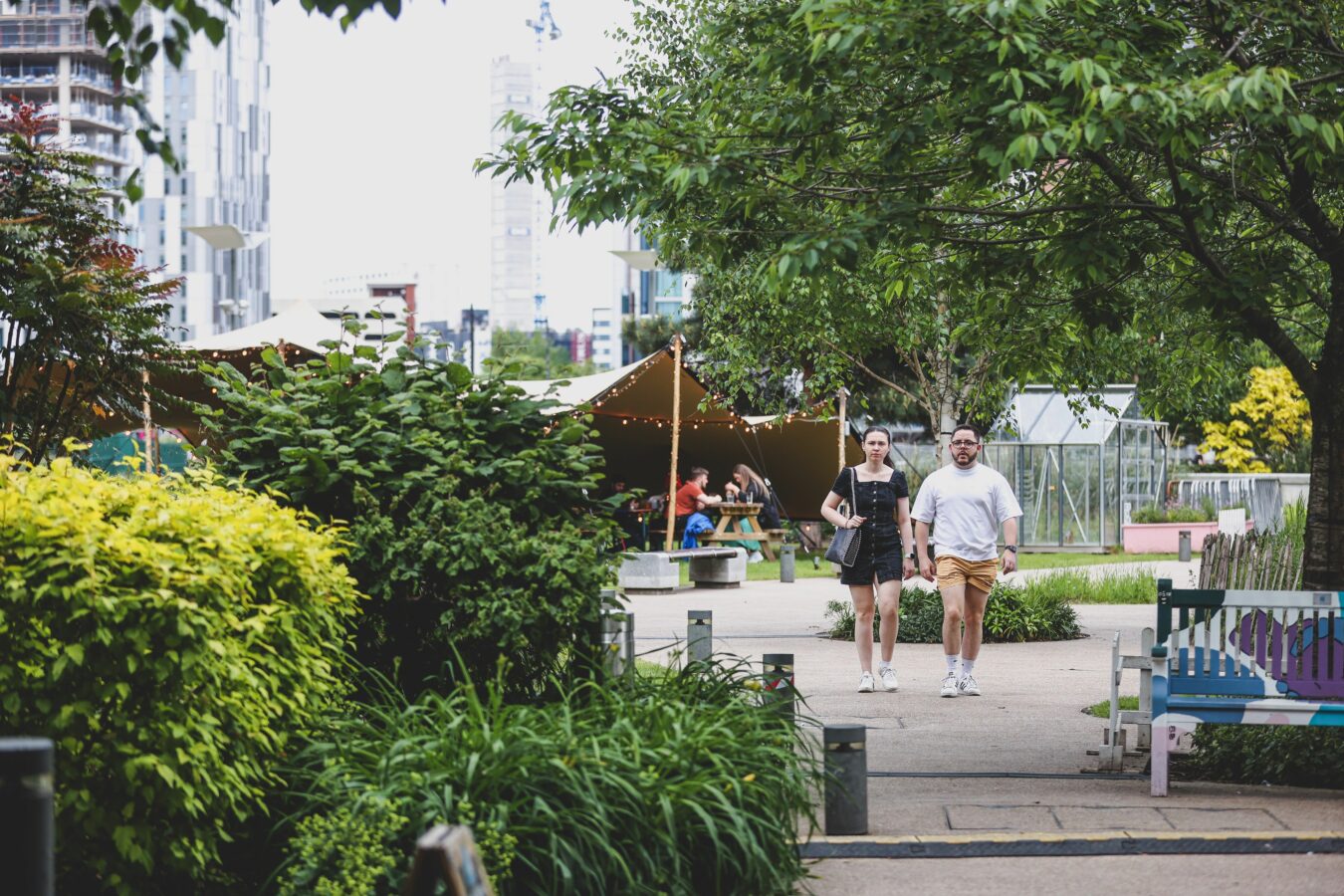 Couple walking through the garden