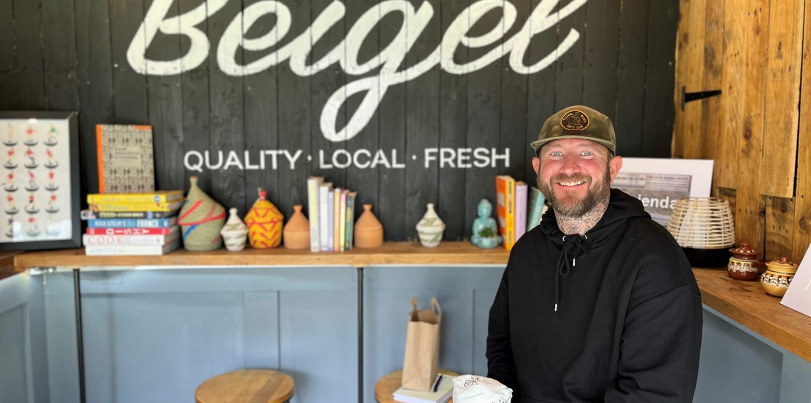 Rick sat in his Beigel container