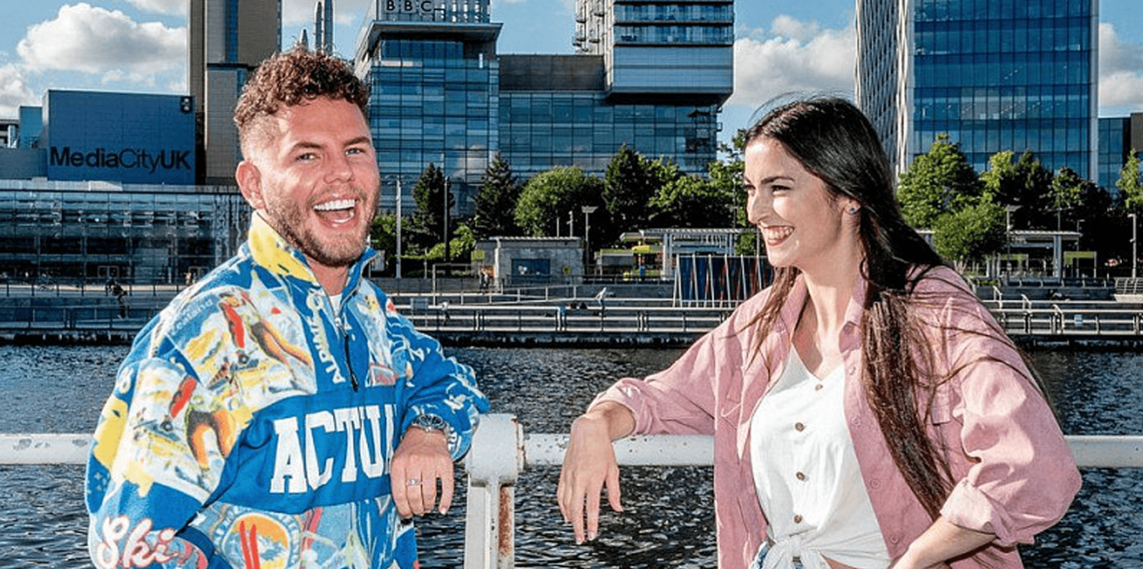 Scott Mills and female standing by the MediaCity Quays