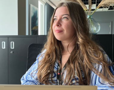 girl in office looking at the view